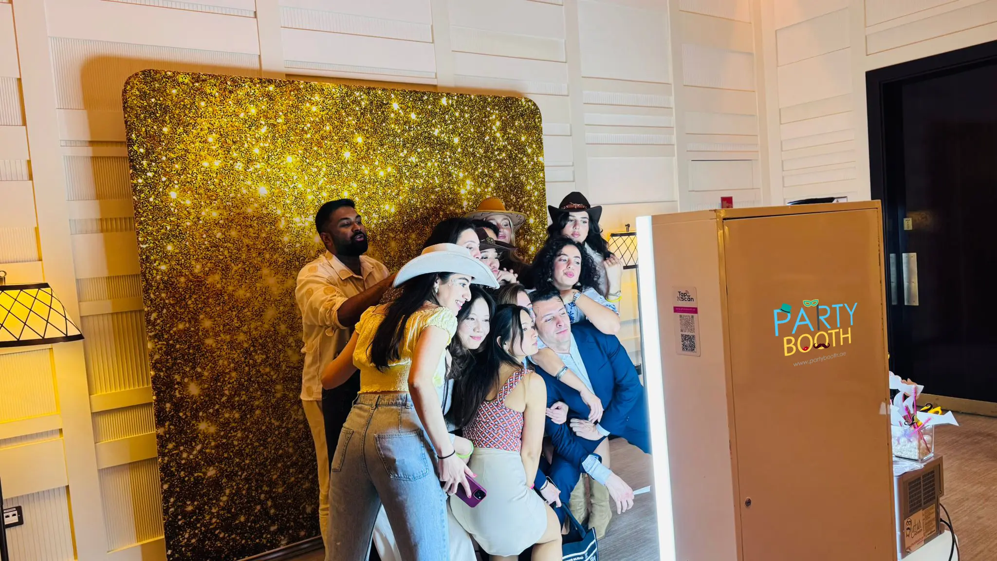 Guests posing at a PartyBooth wedding photobooth in Abu Dhabi
