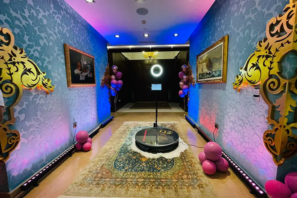 Branded photobooth backdrop and props at a UAE brand activation